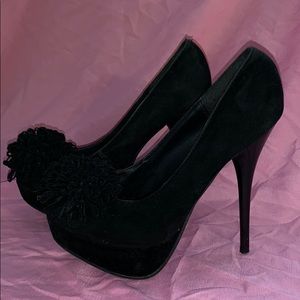 Black suede heels.